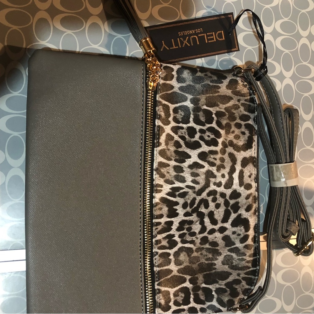 Deluxity purse. new with tags